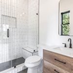 Custom Guest Bathroom with Standing Shower and Seat