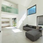 Open Concept Living Room Remodel with Vaulted Ceilings and Elevated Windows